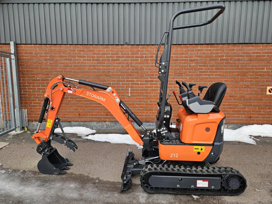 Minigrävare Storarm Z12, 3-cyl Kubota, joysticks, S30/180, premium